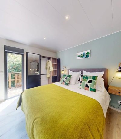 Intérieur Suite Céladon lodge bois lumière naturelle Casa Dina